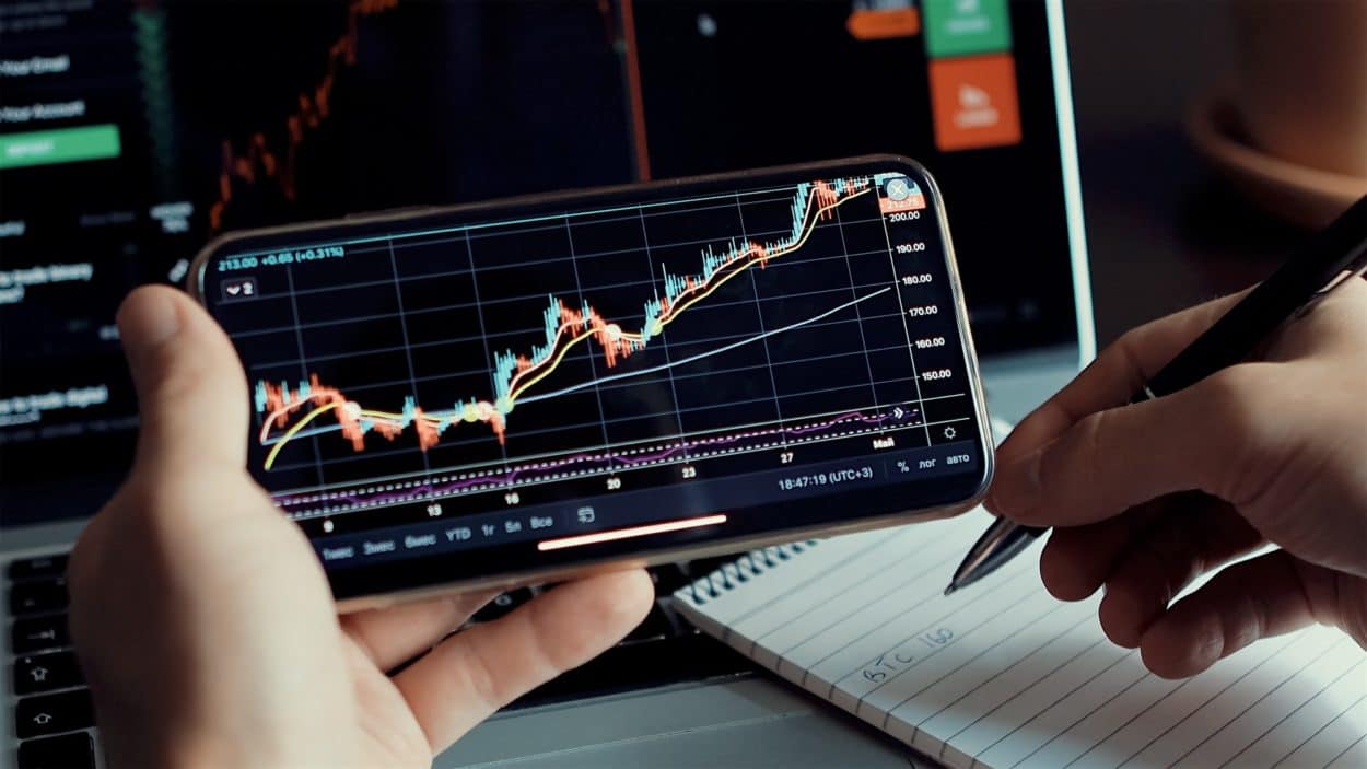 Stock market trader analyzing bitcoin price trend